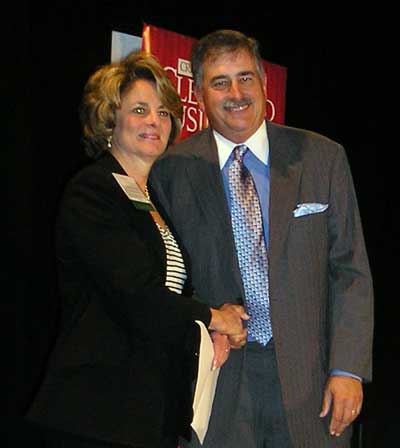 Honoree Leslie Dunn with Brian Tucker of Crains