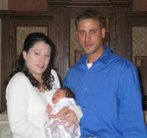 Paul, Kathleen and Connor at christening