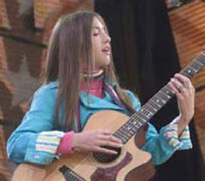 Kate Voegele playing guitar